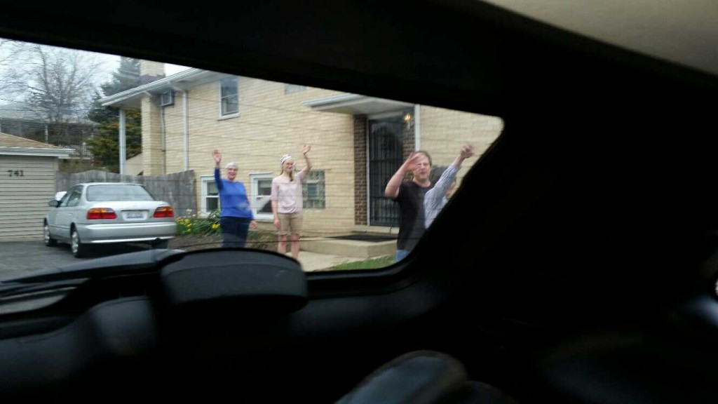 Waving goodbye to family 